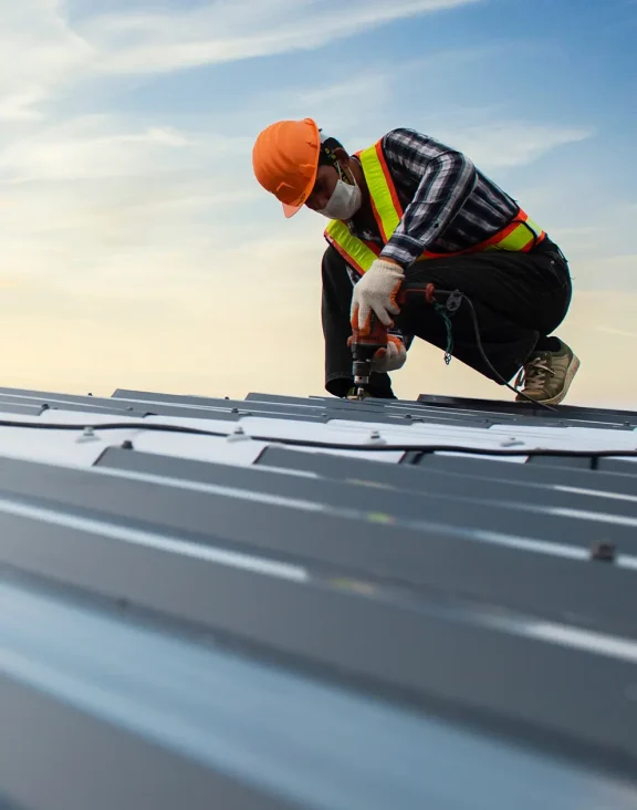 Worker looking after a building